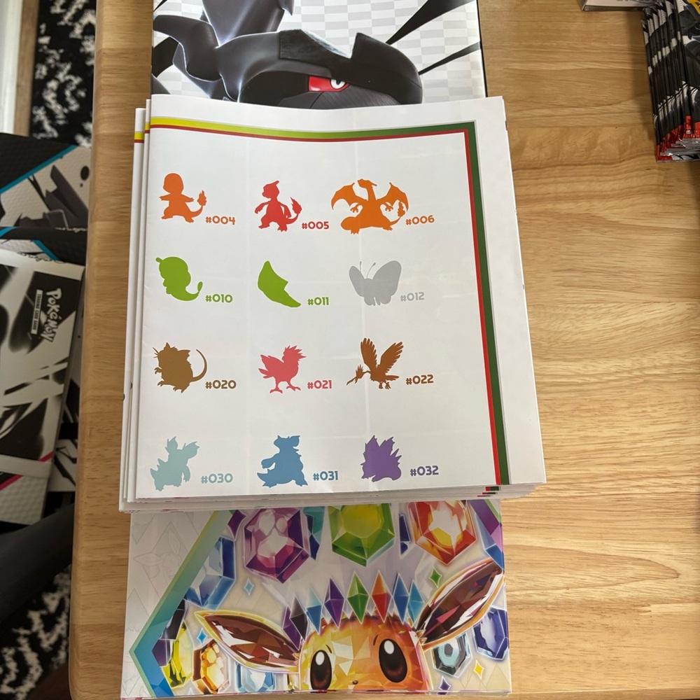 64 Pokemon Posters Total : Prismatic Evolutions x 20 & 151 x 31 & Unova x 13